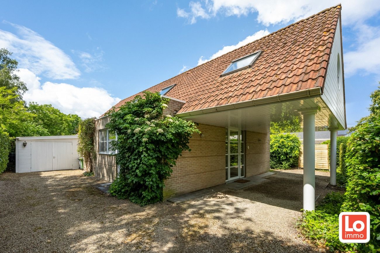 Charmante open woning met carport en héél grote aangename tuin gelegen op een toplocatie vlakbij het centrum van Zaffelare! foto 4