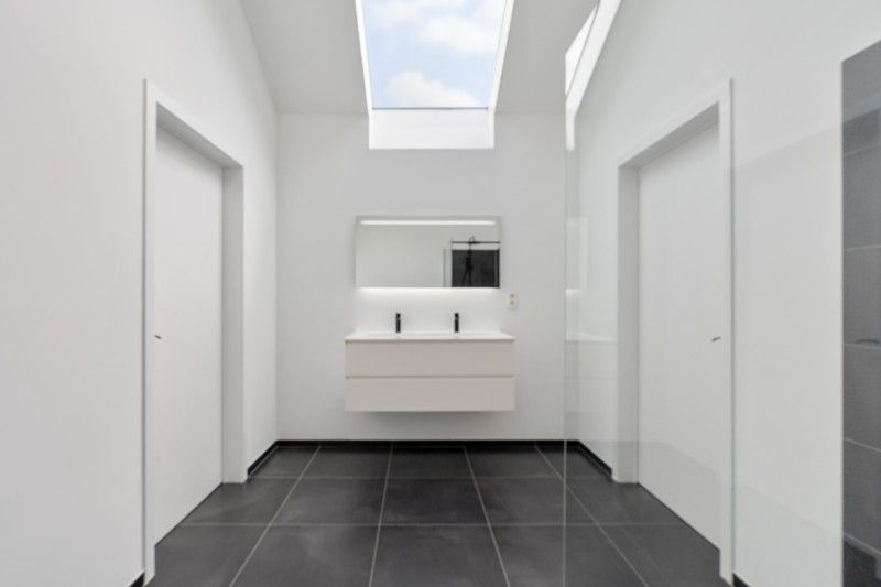 Zeer ruim en stijlvol penthouse met tuin en garage foto 17
