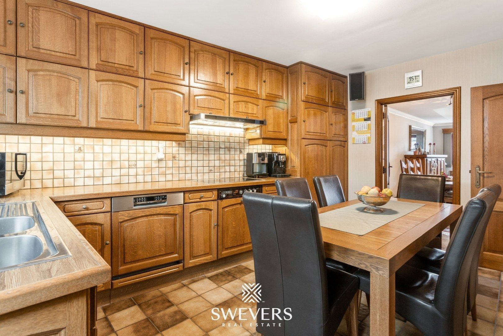 Ruim duplexappartement met grote veranda, riant terras, tuin en garage in hartje Lummen foto 7