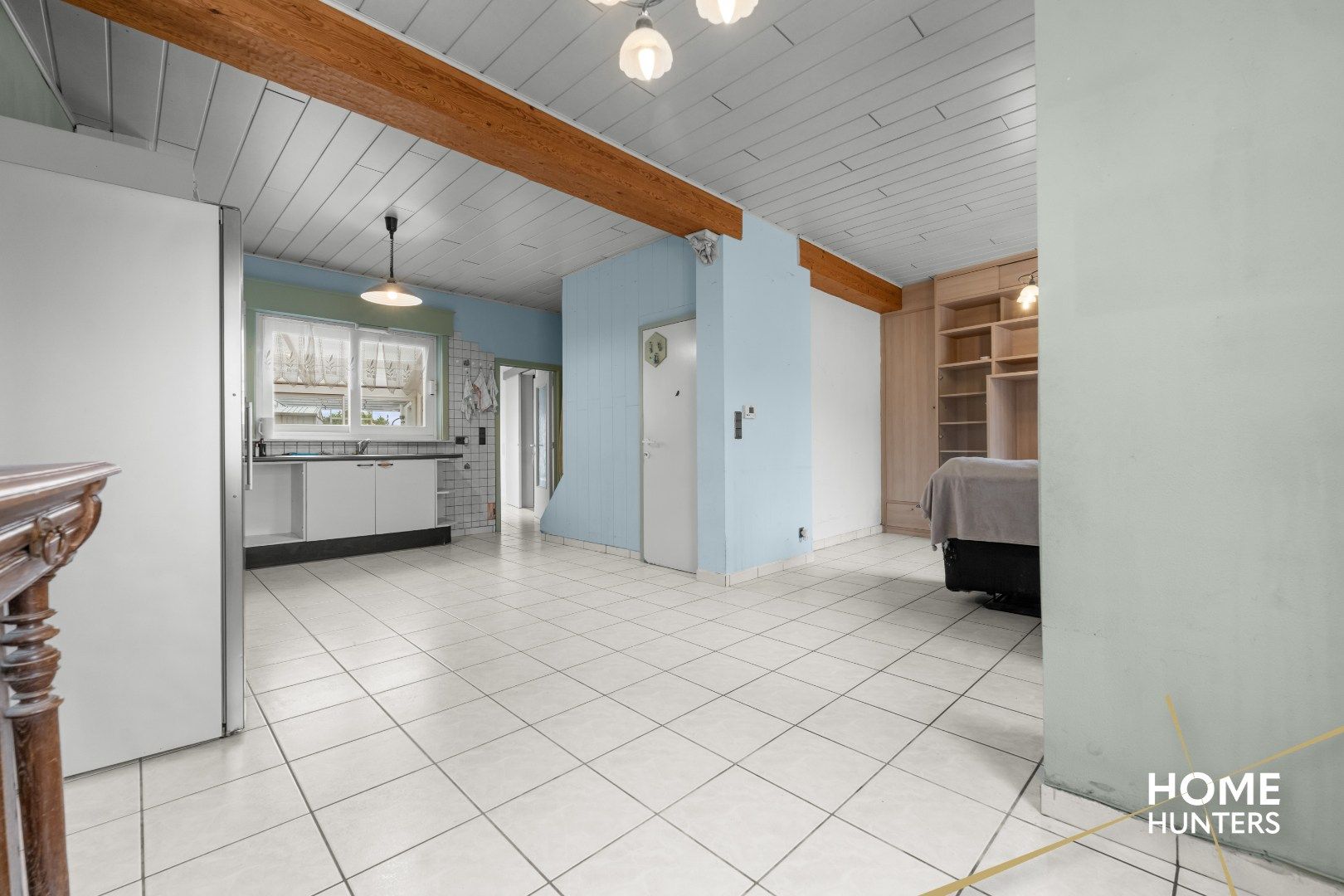 Op te frissen woning met charmante tuin in het hart van Mesen foto 7