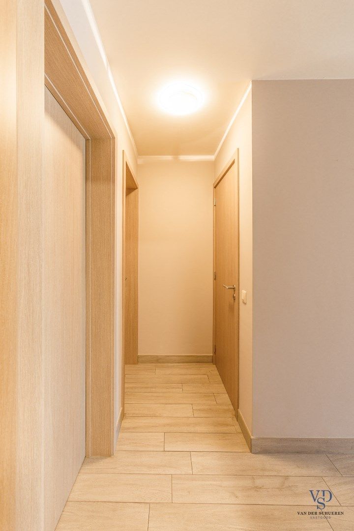 Gelijkvloers 2 slpk-appartement met terras foto 16