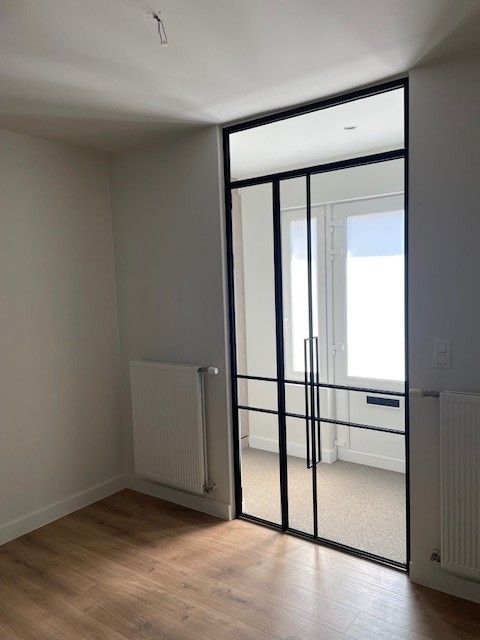 Te huur – Gerenoveerde woning met 2 slaapkamers op toplocatie in Houthalen foto 2