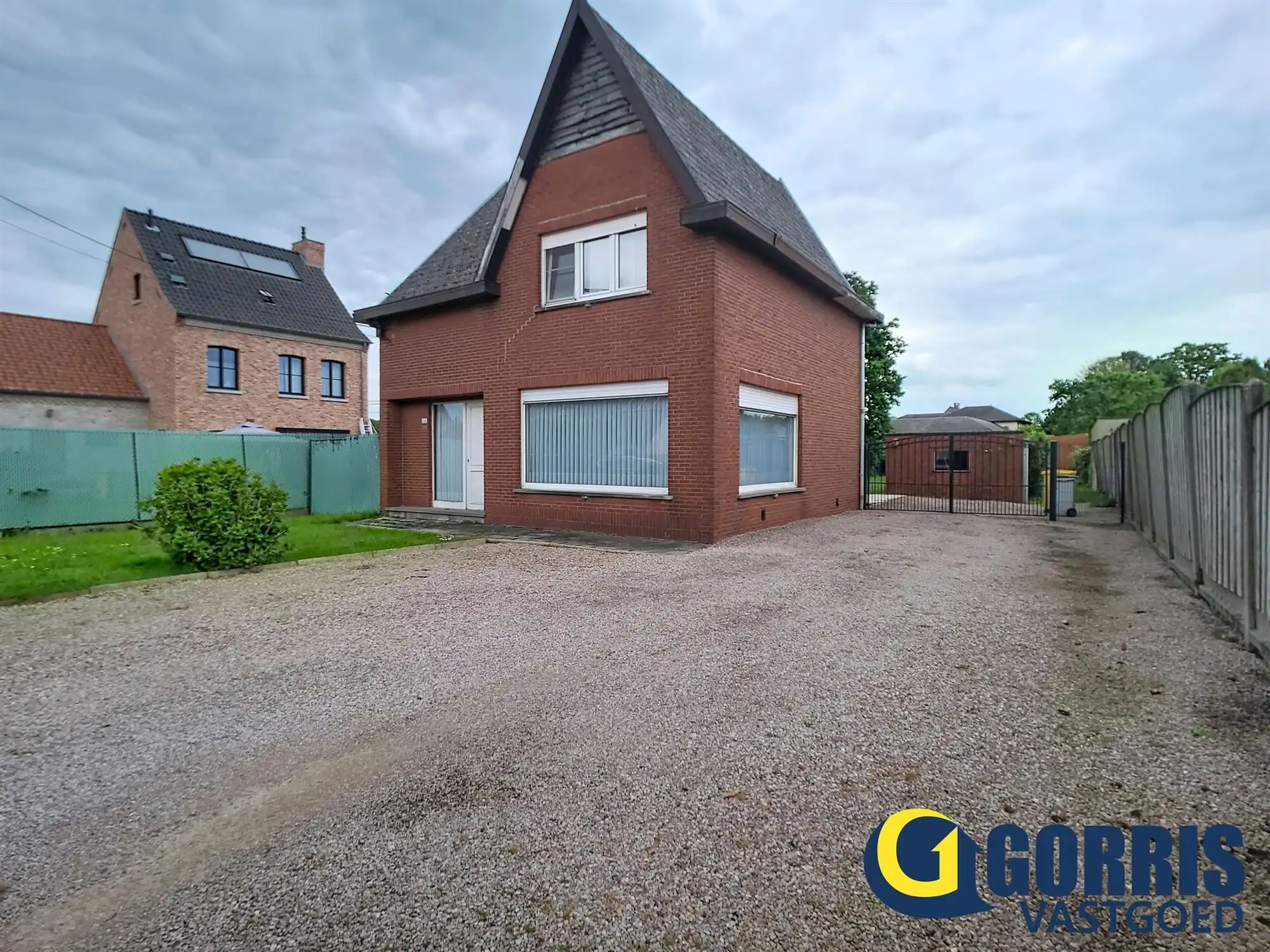 Te renoveren woning met ruime tuin in het centrum van Hulshout foto 8