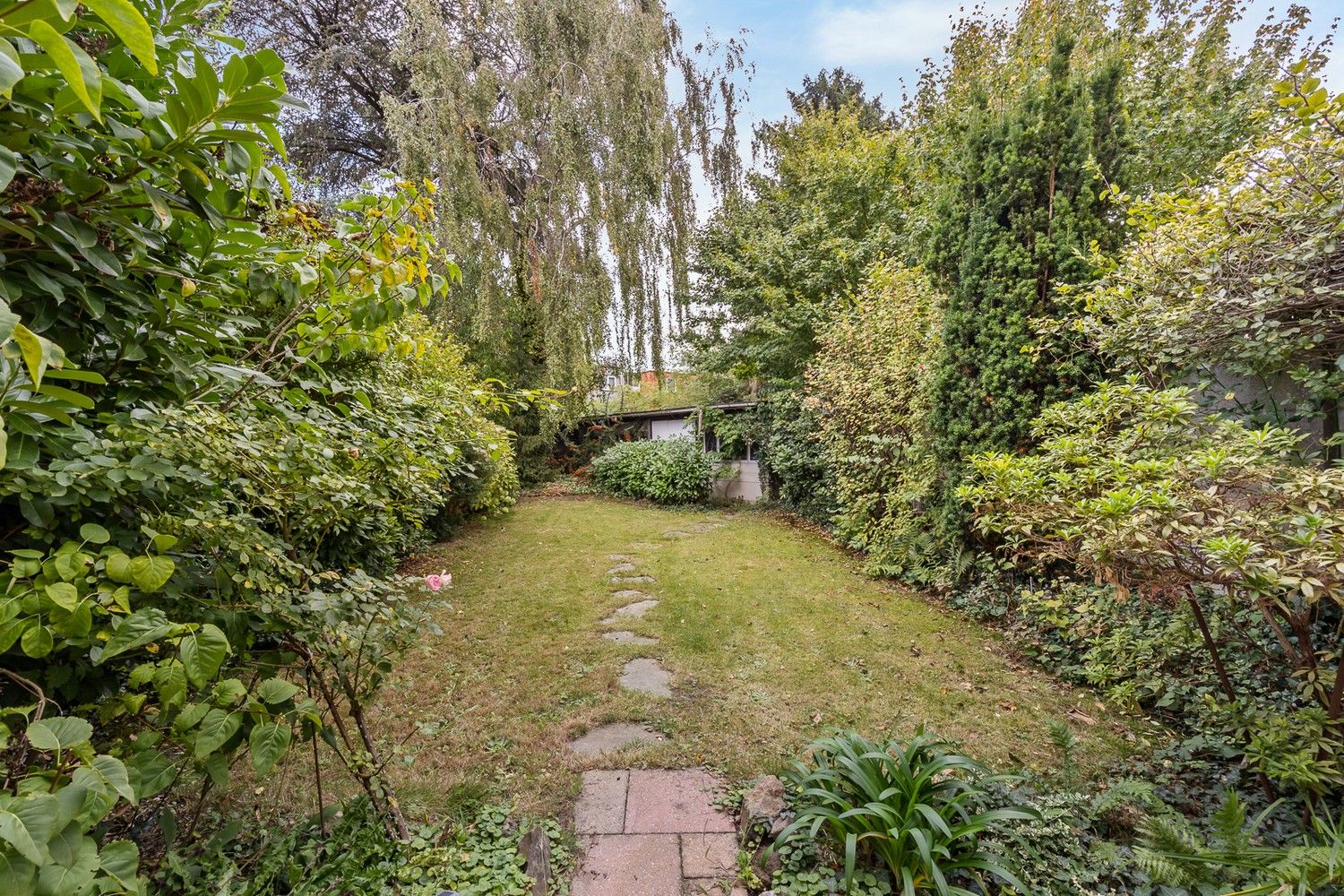 IN OPTIE Ruim en gezellig bel-étage appartement met tuin te Deurne foto 14