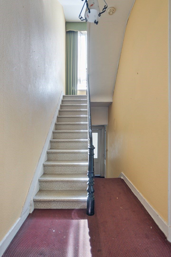 Ruime herenwoning met 8 slaapkamers, ruime tuin en garage in het centrum van Leuven – EPC 316 kWh/m² - bewoonbare opp. 283 m² foto 17