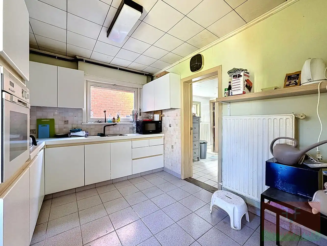 Halfopen gezinswoning met 3 slaapkamers en prachtige tuin te Ettelgem foto 9