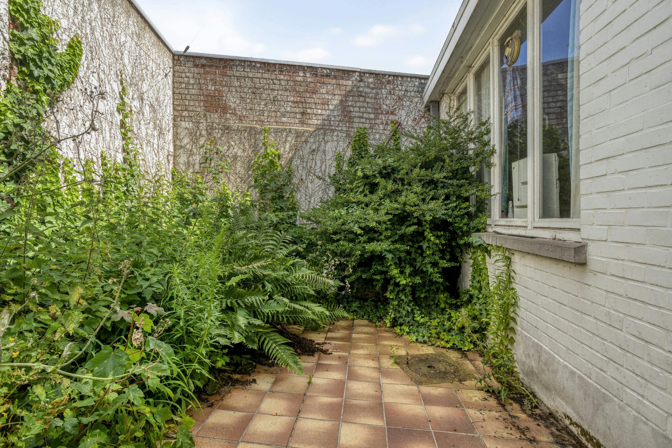 Huis met handelsruimte te koop in centrum Roeselare foto 12