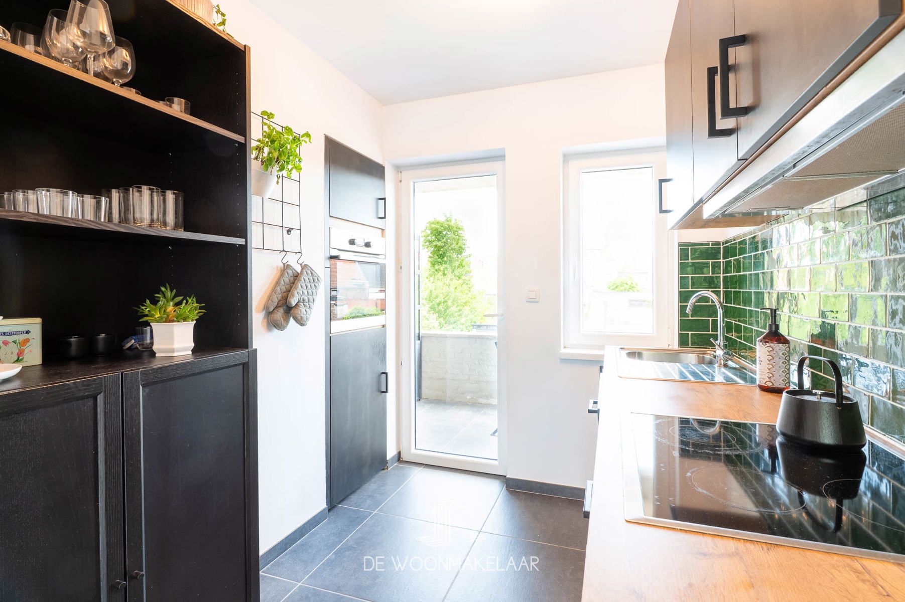 Gerenoveerd app met 2 slaapkamers en terras in hartje Niel foto 3