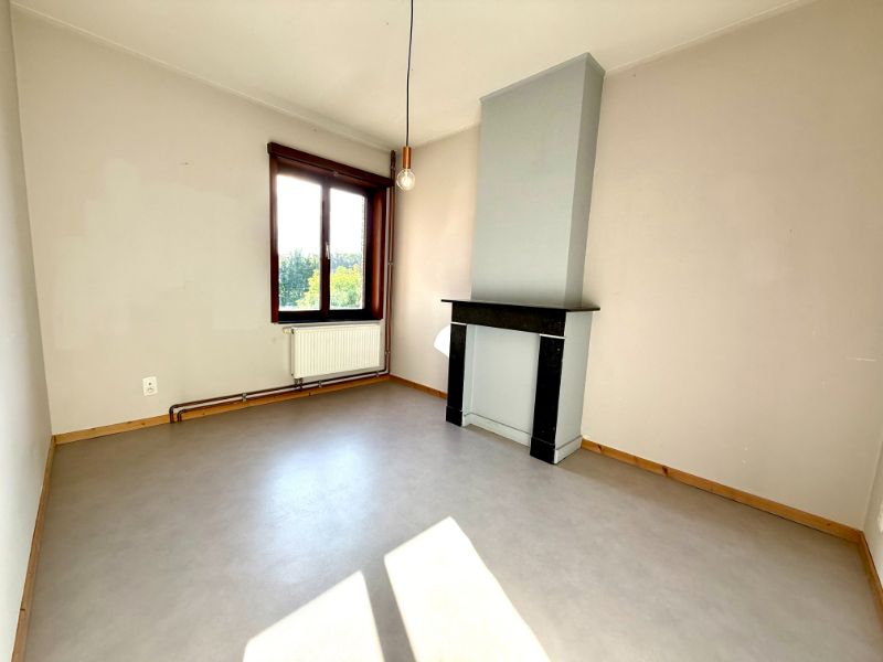 Charmante halfopen gezinswoning 3 kamers, tuin en garage foto 13