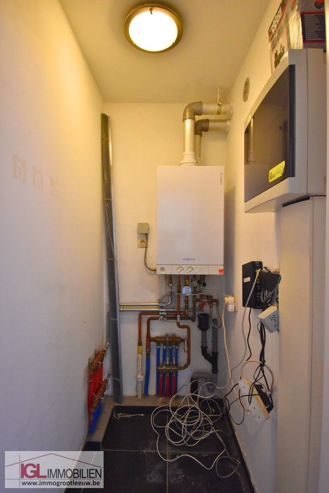 Recent appartement met 2 slaapkamers en grote garage in het centrum van Vlezenbeek foto 12