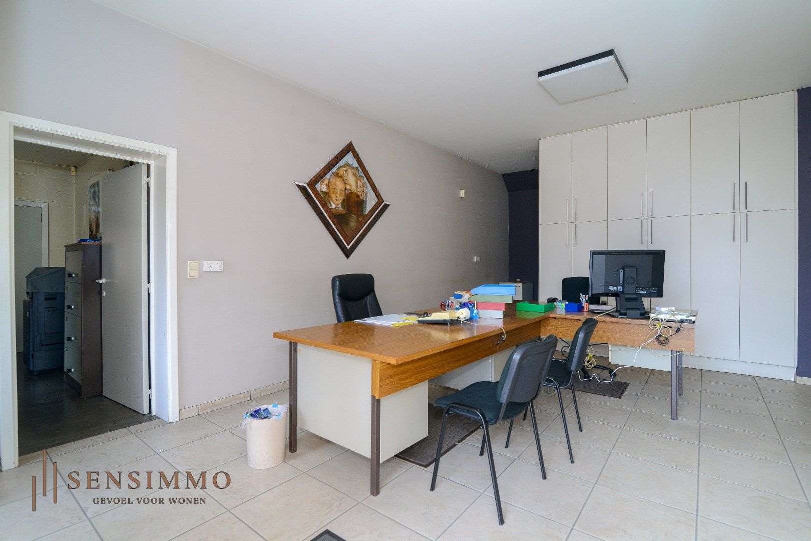 INVESTEERDERSOPPORTUNITEIT - GEBOUW MET TOONZAAL + 4 APPARTEMENTEN + MAGAZIJN + GARAGEBOXEN + BOUWGROND foto 11