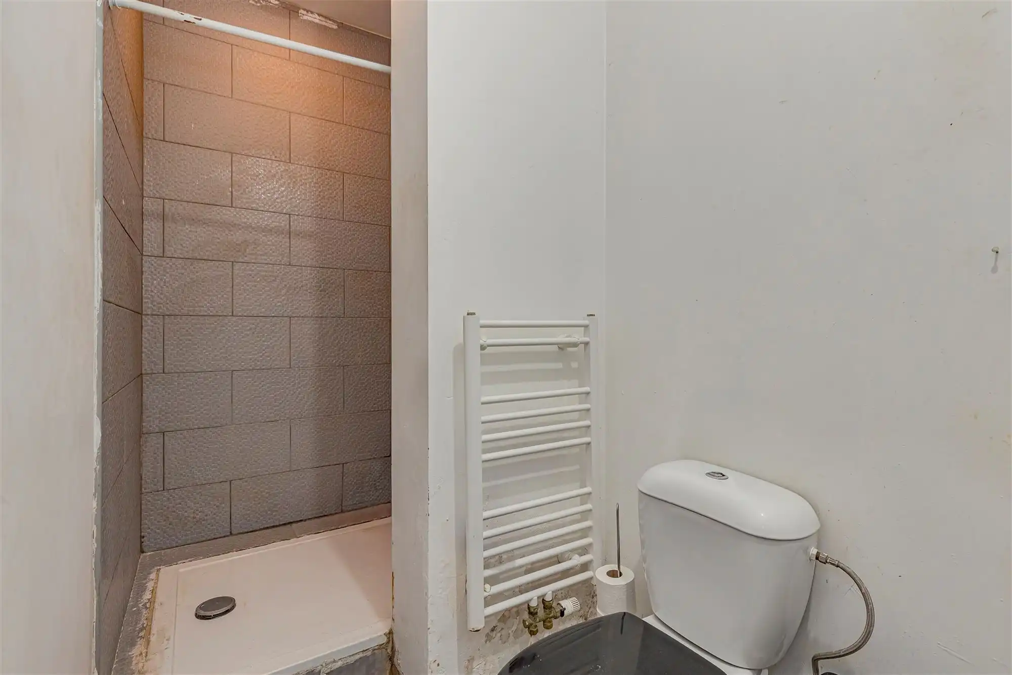 Woning opgedeeld in 4 verhuurde appartementen foto 8