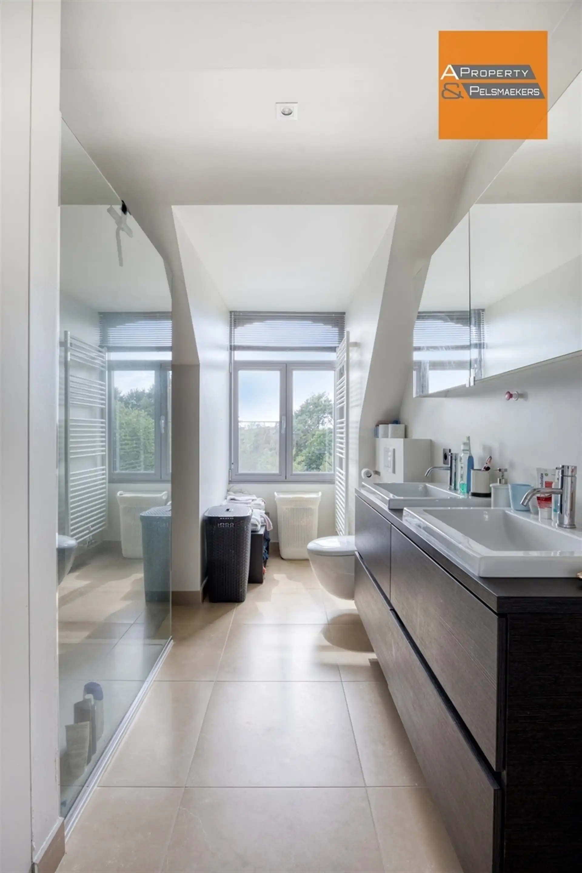 Instapklaar duplex-appartement met groen uitzicht in het centrum van Ottenburg foto 18