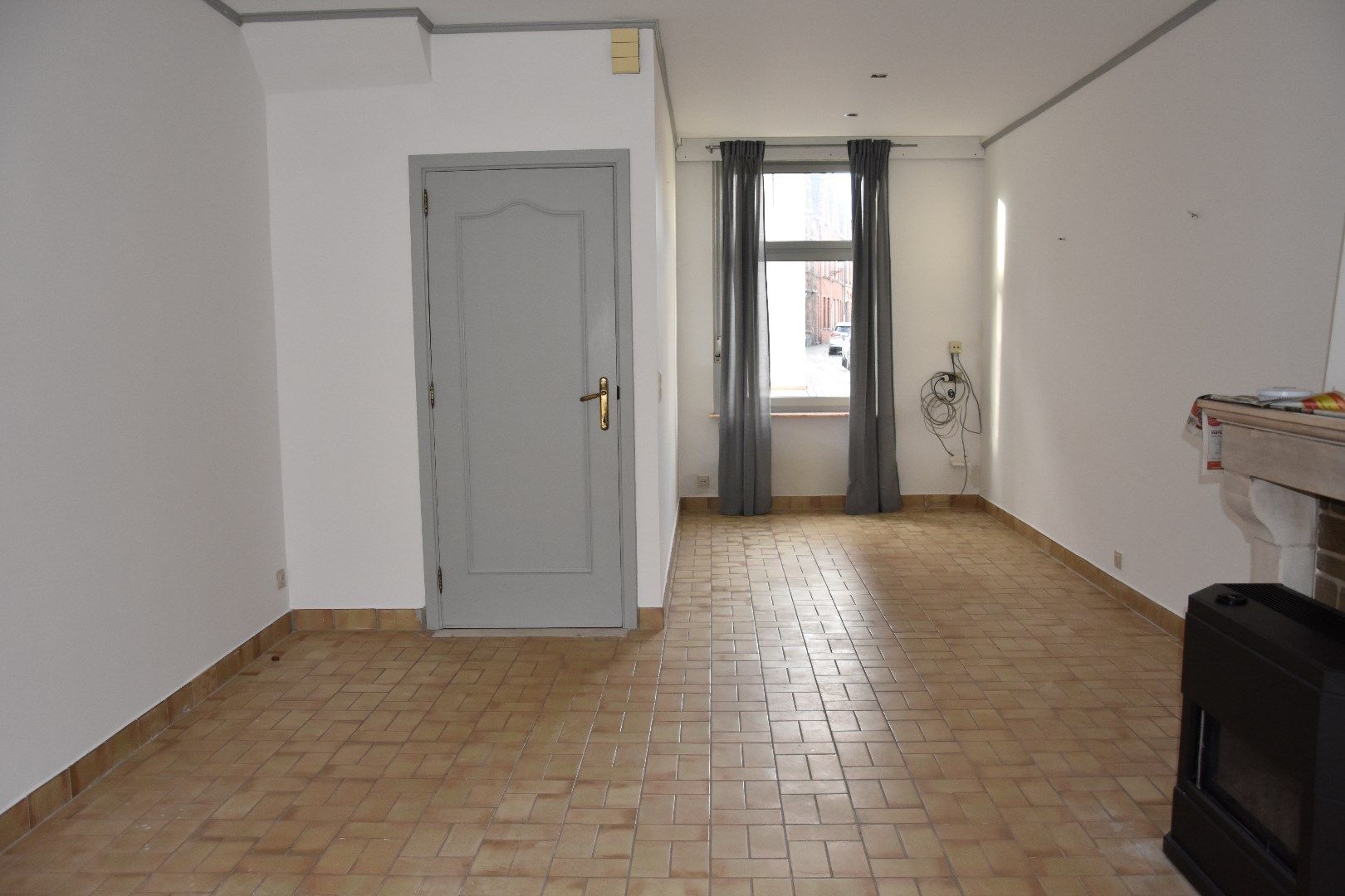 Opgefriste rijwoning met stadskoertje foto {{pictureIndex}}