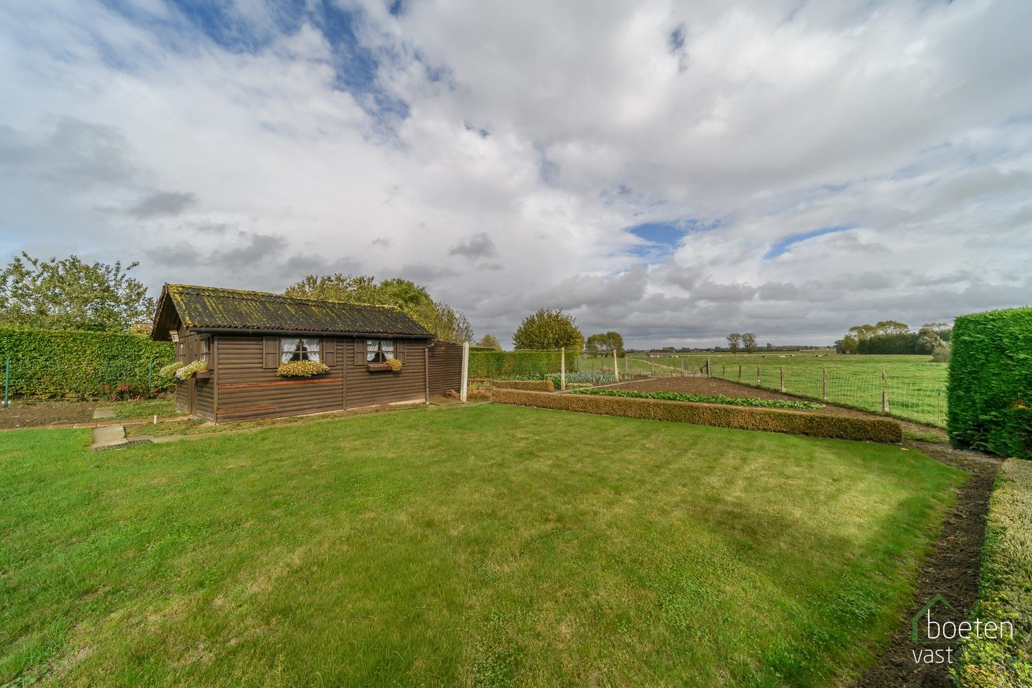 Reninge: Verzorgde gelijkvloerse woning met heel wat potentieel, fantastische tuin met open zicht op de Reningse broeken op 1.108m² totale grondopp. foto 21