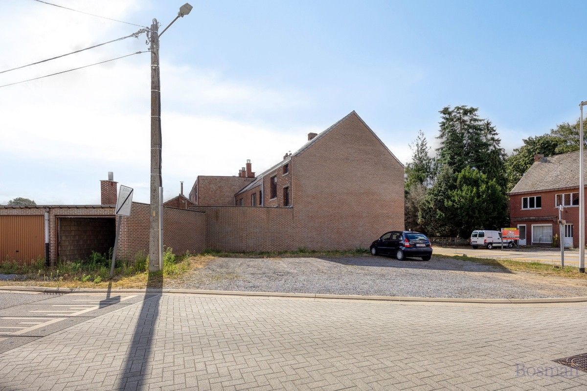 Halfopen bebouwing met 5 garageboxen te koop in Ham foto 21