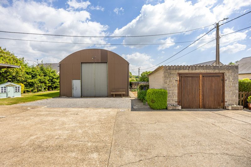 Ruime woning met loods op een perceel van 14are foto 25
