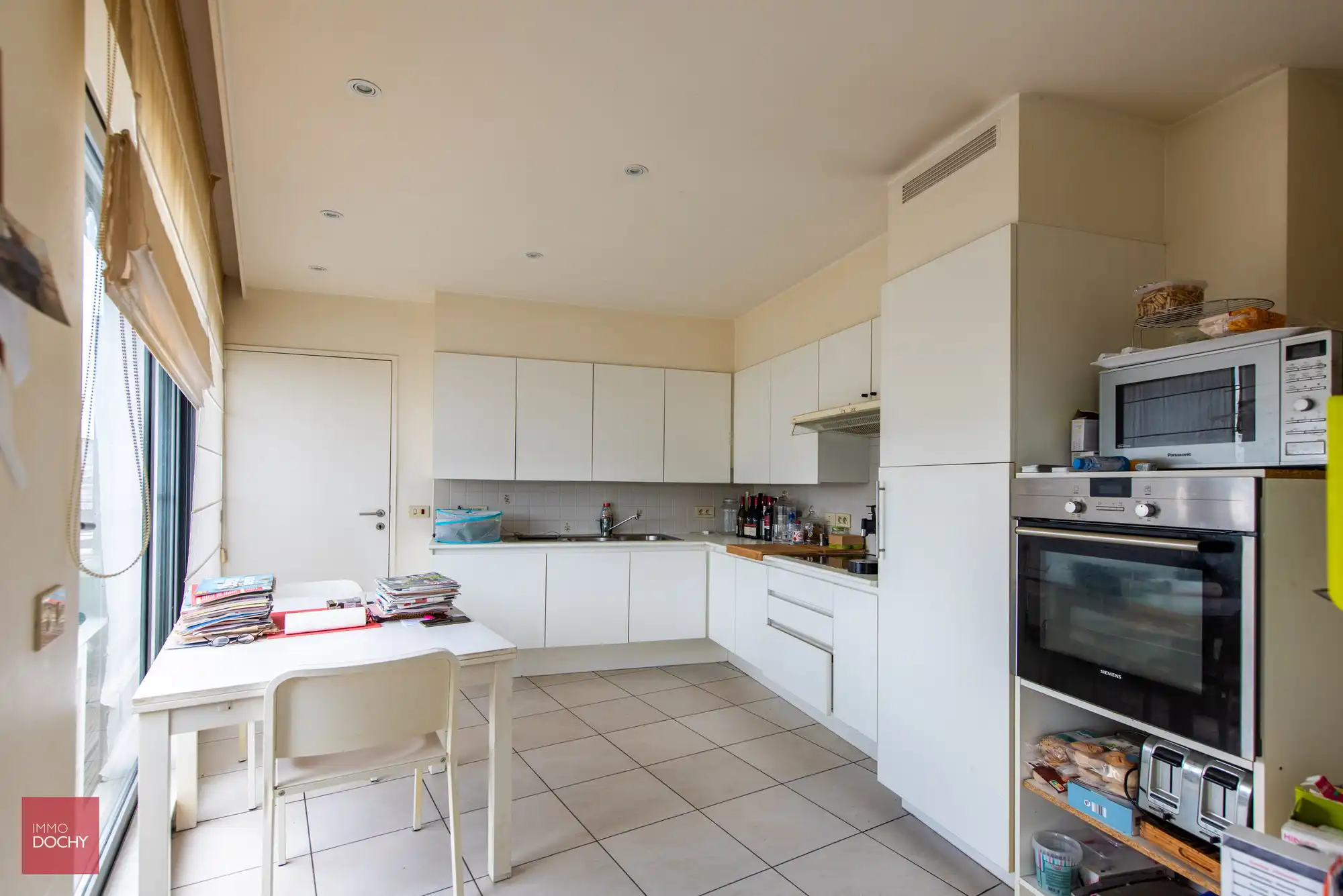 Heel ruim appartement op topligging met zicht op de markt foto 7