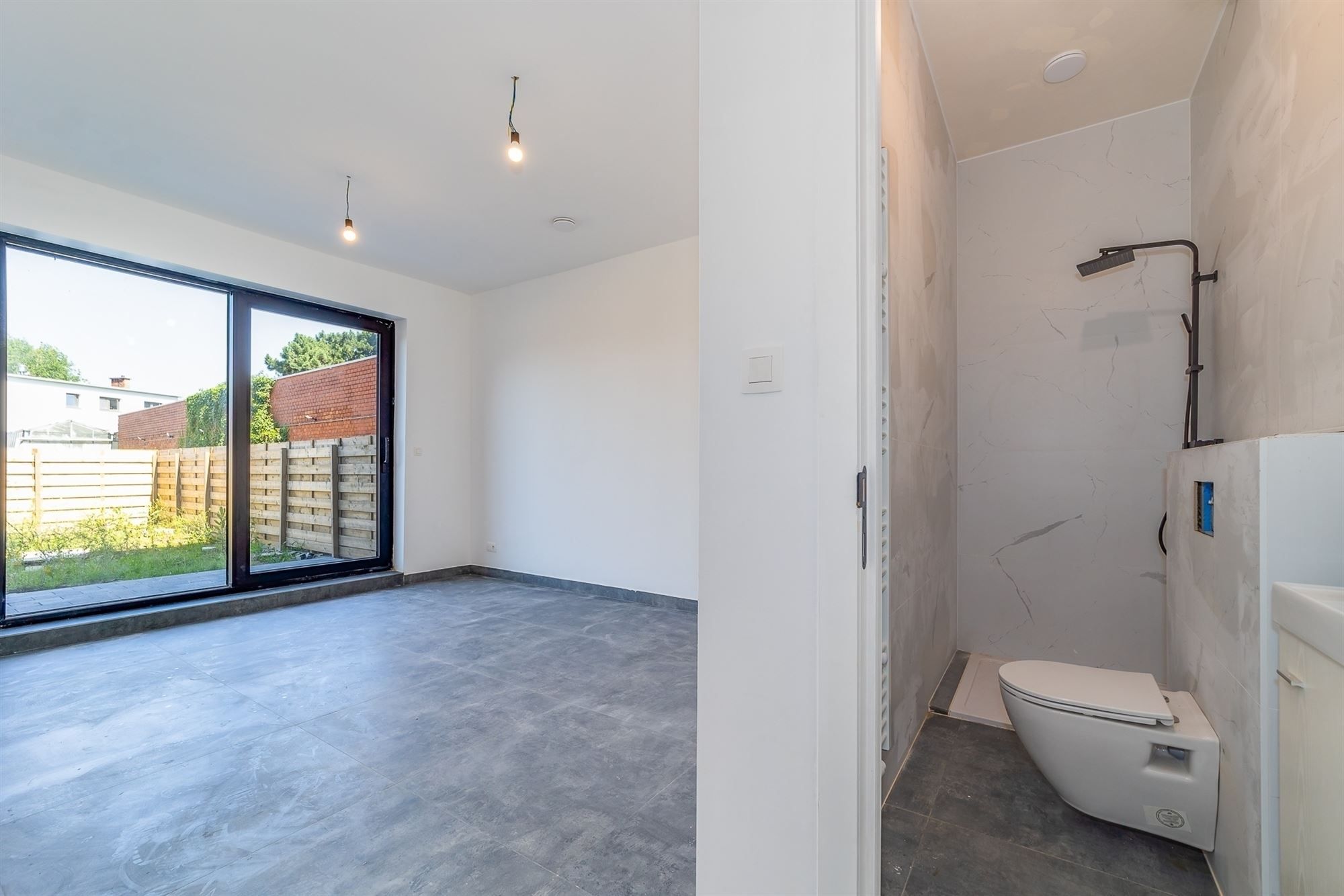 Gelijkvloers nieuwbouw appartement met 3 kamers en ruime tuin te Borsbeek foto 17