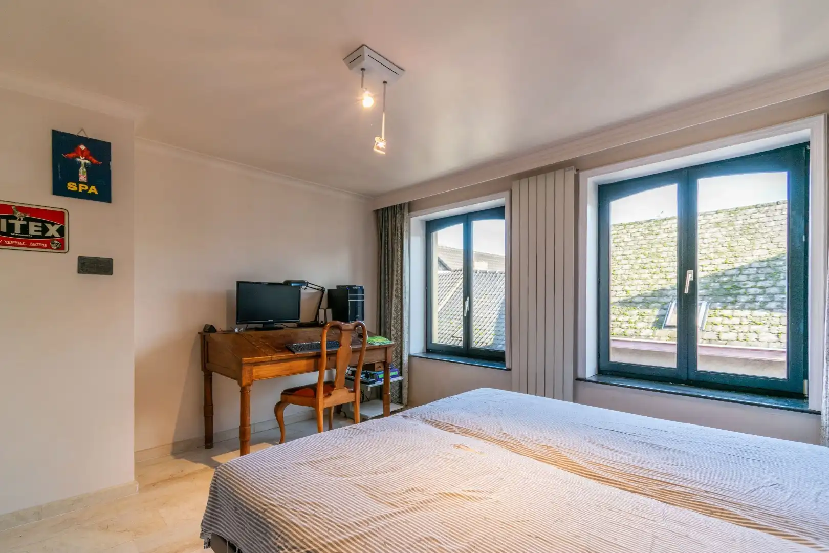 Karaktervol hoogwaardig afgewerkt gebouw met winkelruimte en woonst  foto 9