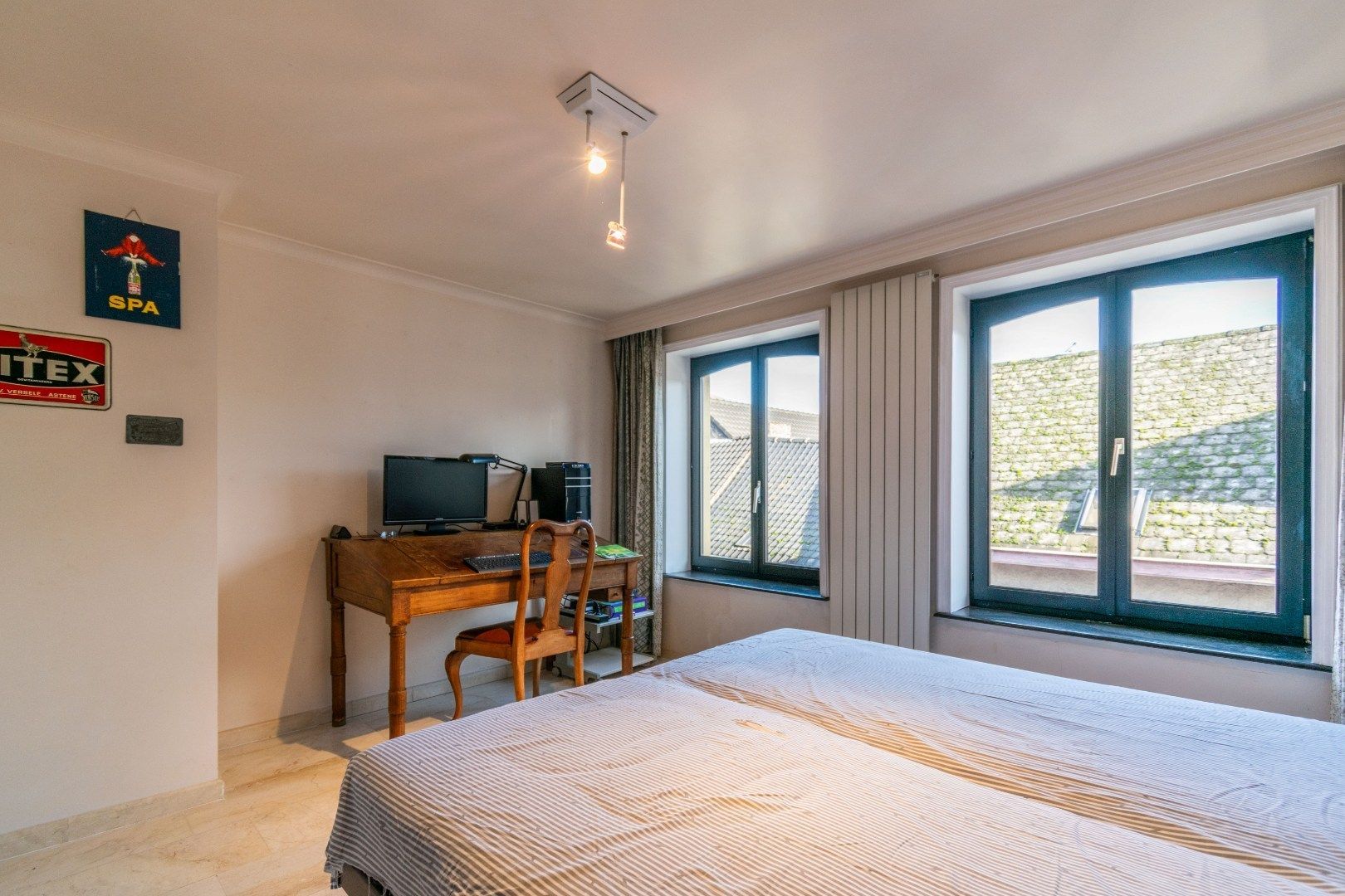 Karaktervol hoogwaardig afgewerkt gebouw met winkelruimte en woonst  foto 9