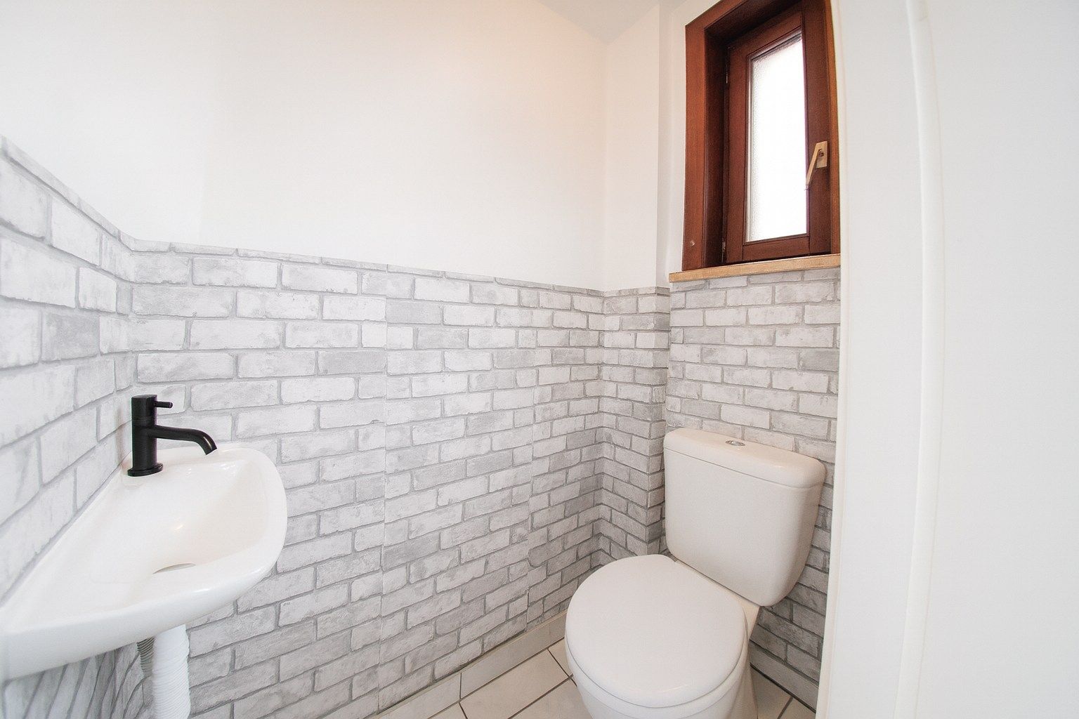 Te koop: Charmante rijwoning met diepe tuin in hartje Sint-Niklaas! foto 3