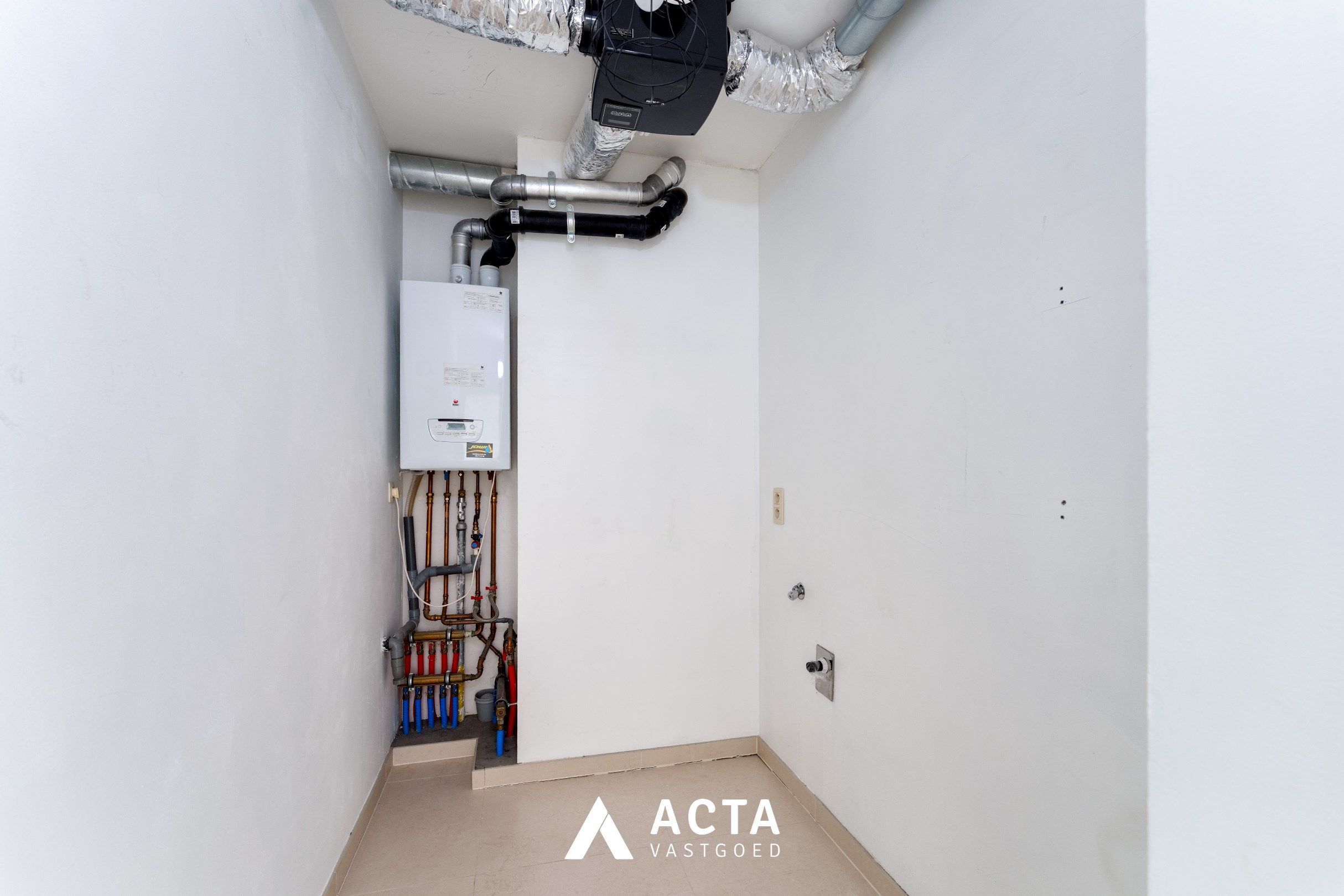 Nieuwbouwappartement met twee slaapkamers en terras in Mariakerke foto 11