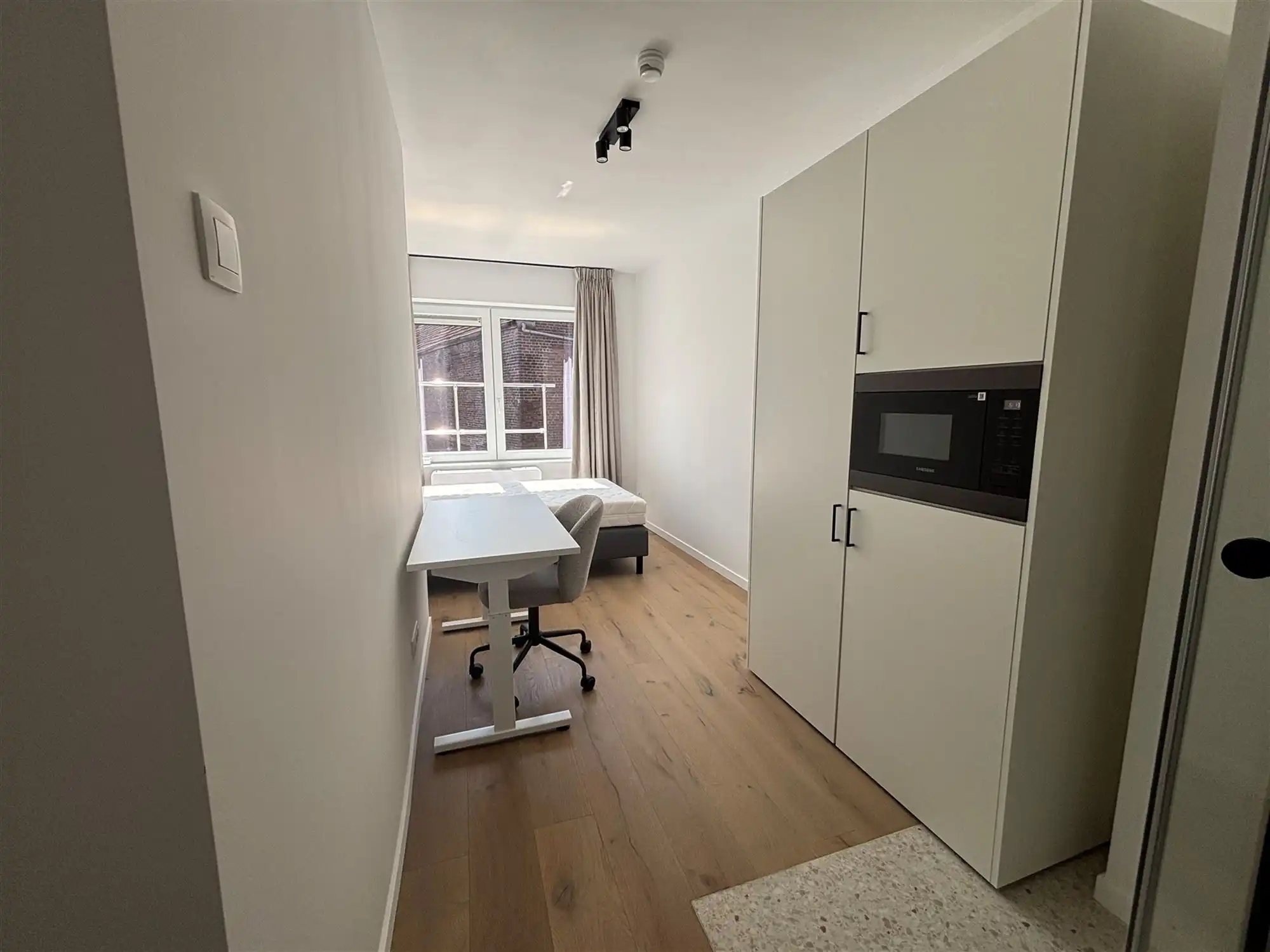 Moderne studentenkamer met airco foto 4