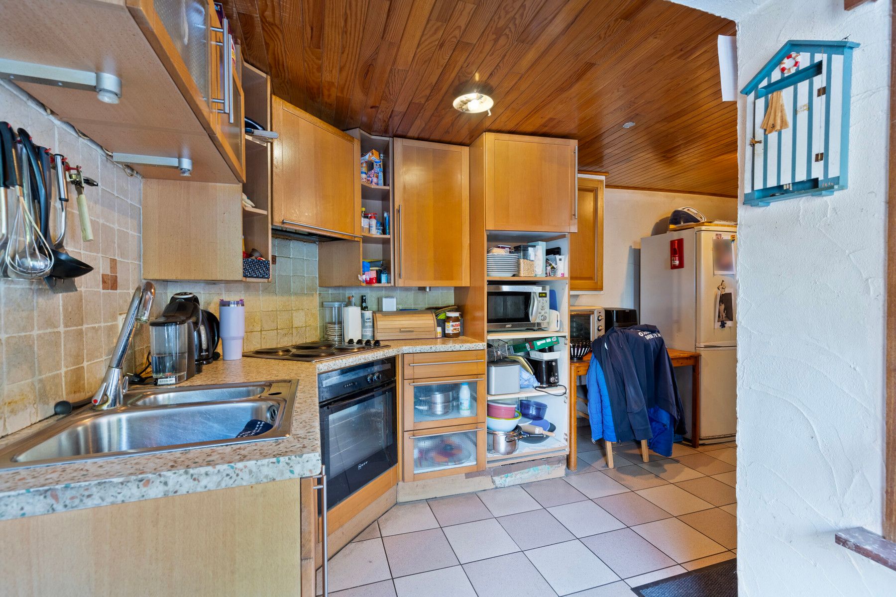 Te renoveren woning met 2slpk (mogelijkheid 3) en tuin! foto 9