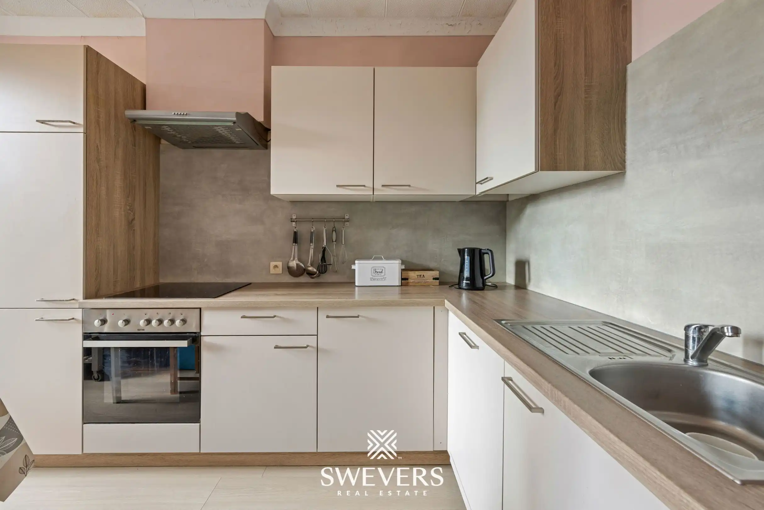 Gerenoveerd investeringspand met 2 verhuurde appartementen te Leopoldsburg foto 24