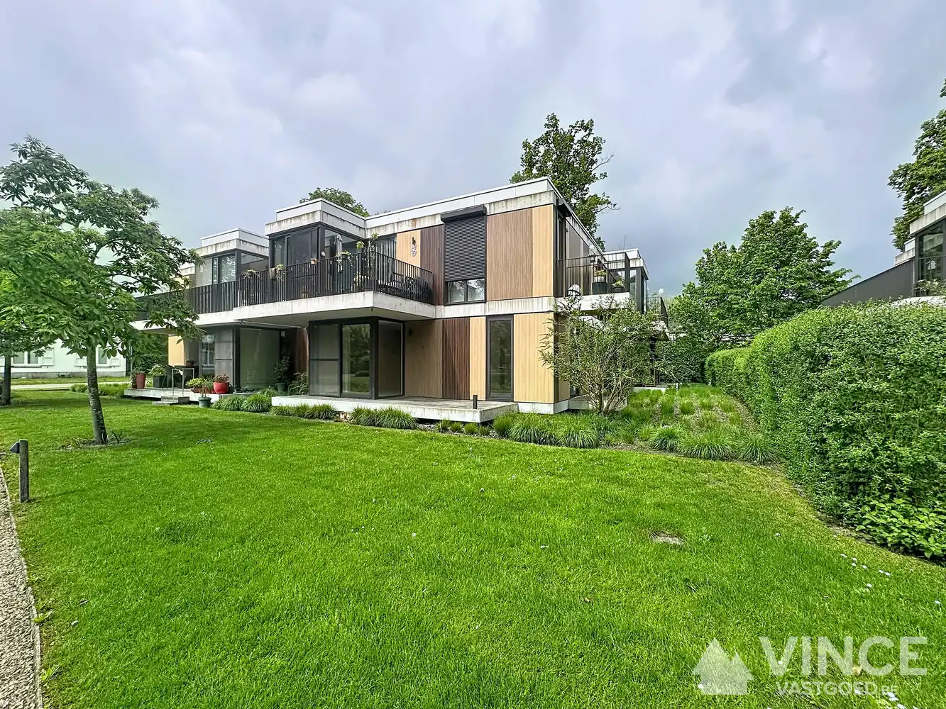 Top-appartement, gelijkvloers foto {{pictureIndex}}