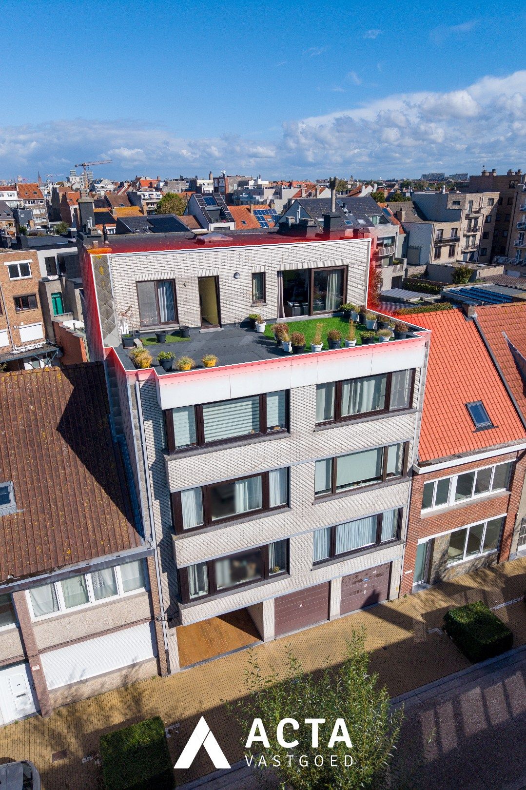 Dakappartement met zonnige terrassen in Mariakerke foto 16