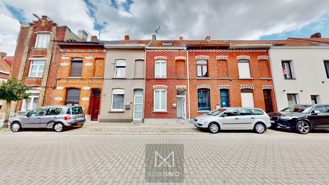 Gerenoveerde woning met 3 slaapkamers en stadstuin foto {{pictureIndex}}