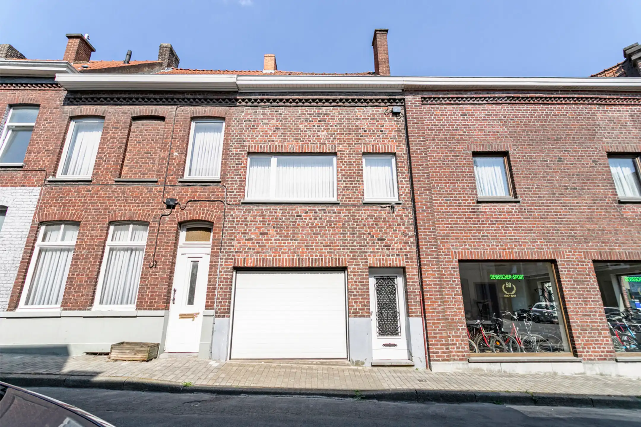 Eigendom met appartement én handelszaak met woonst & garage! foto 15