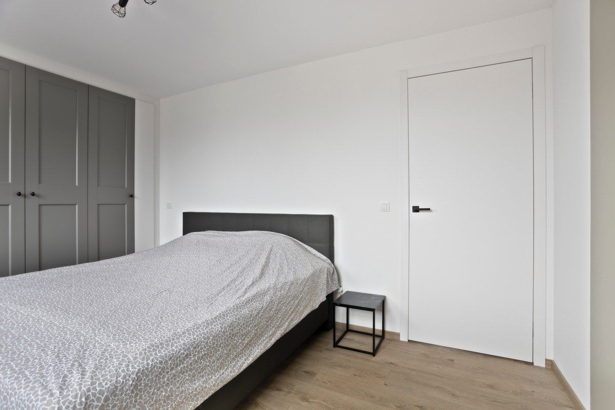 Gelijkvloers BEN-appartement met grote privétuin en parkeerplaats foto 13