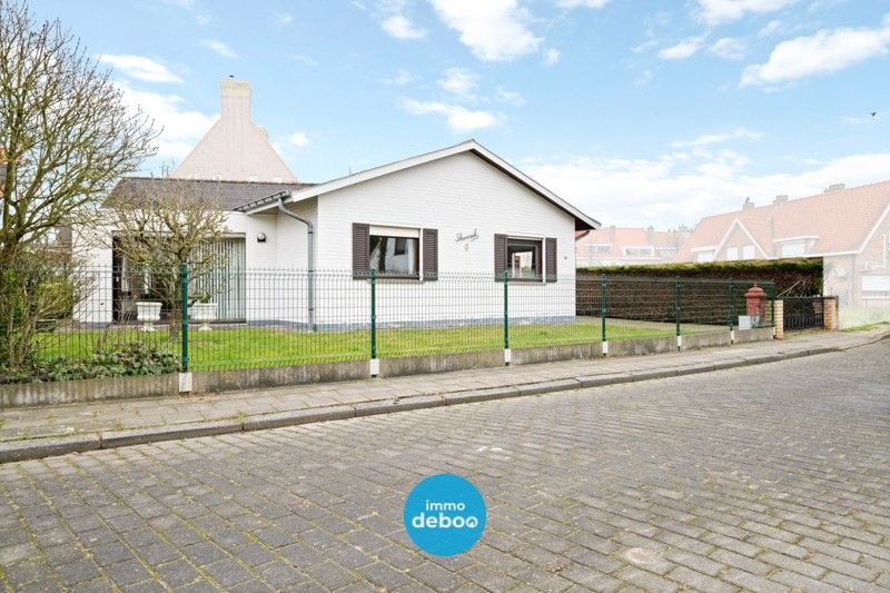 Veelbelovende bungalow met zuidgerichte tuin op absolute toplocatie foto 2