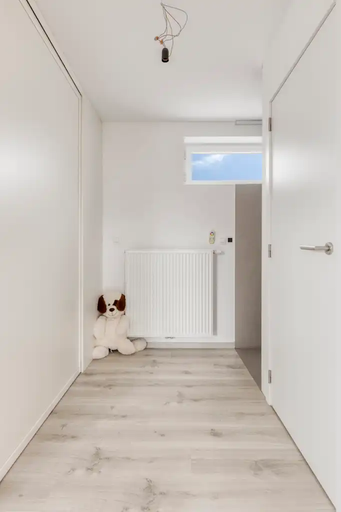 Instapklare halfopen bebouwing met 2 slaapkamers en tuin foto 13