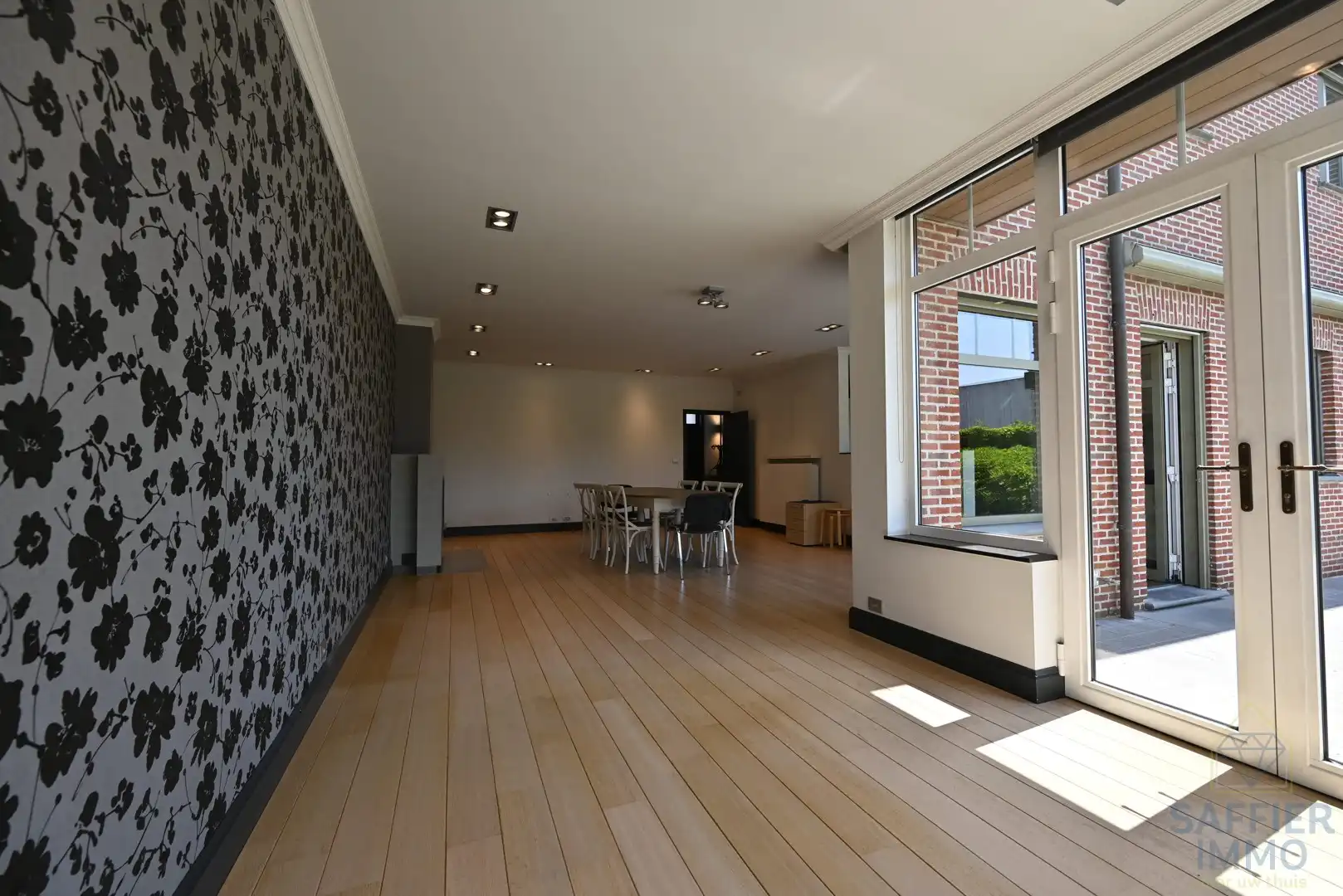 Te huur – Ruime gezinswoning met zonnige tuin in het hart van Ingelmunster foto 3
