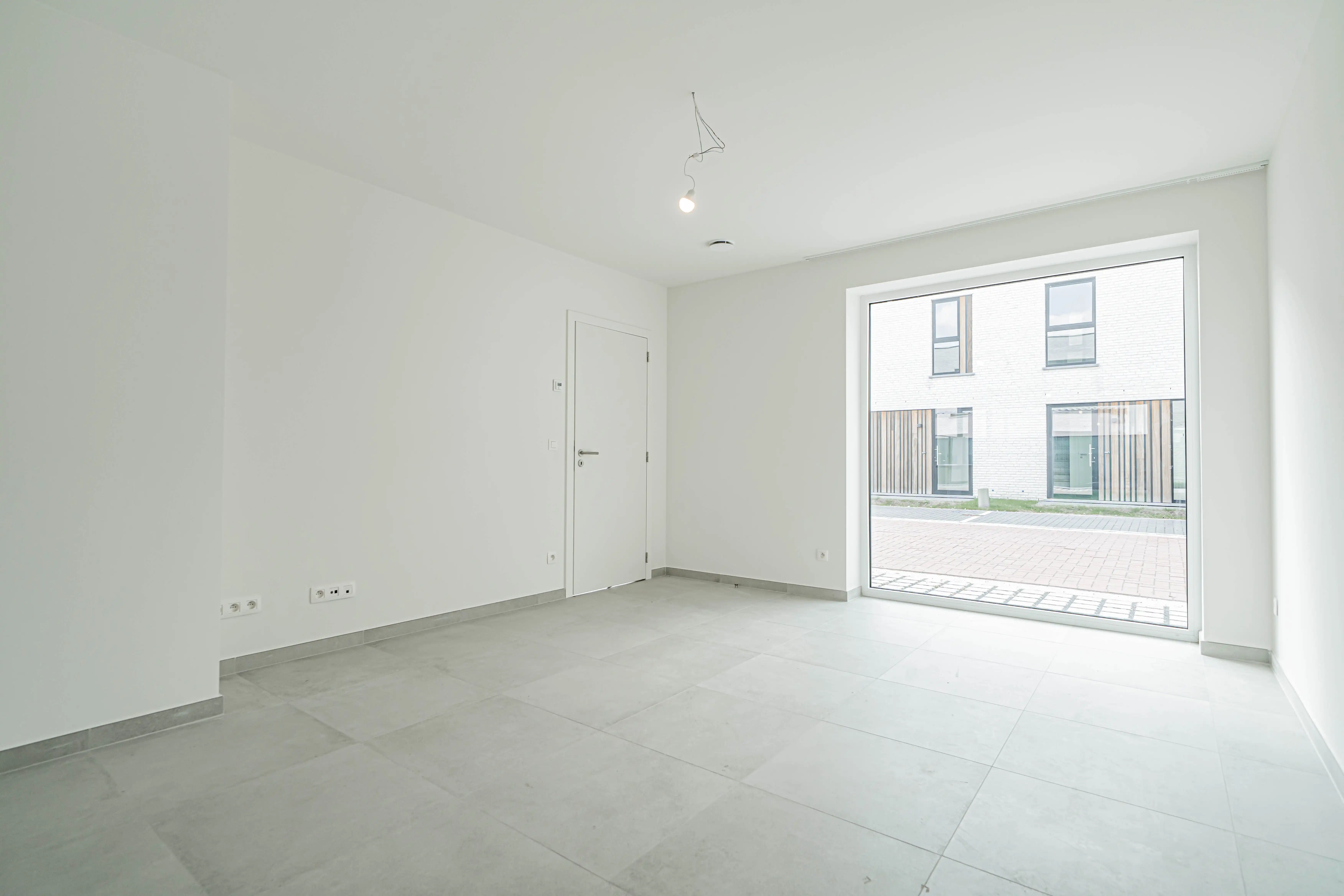 Nieuwbouwwoning met tuin en carport in Evergem foto 4