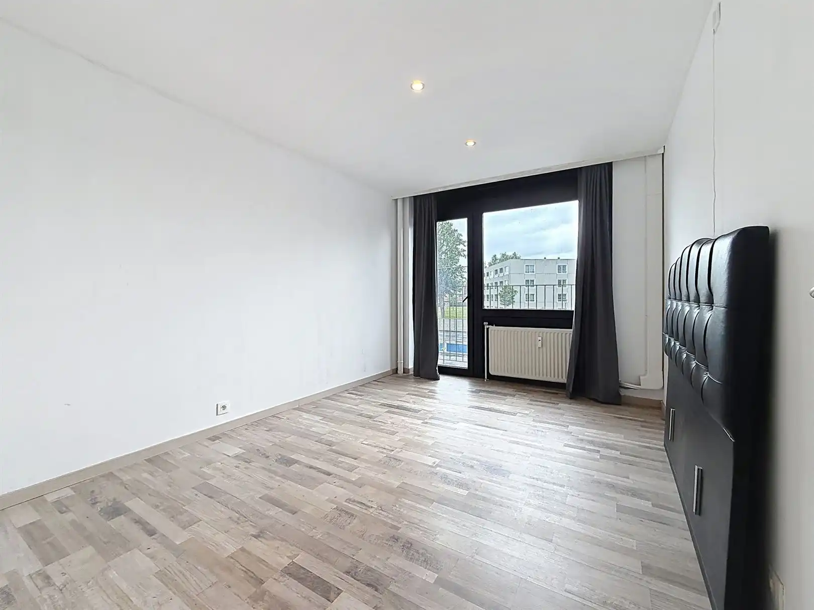 Gerenov. app met 2 slpks, 1ste V, kelder en garagebox foto 17