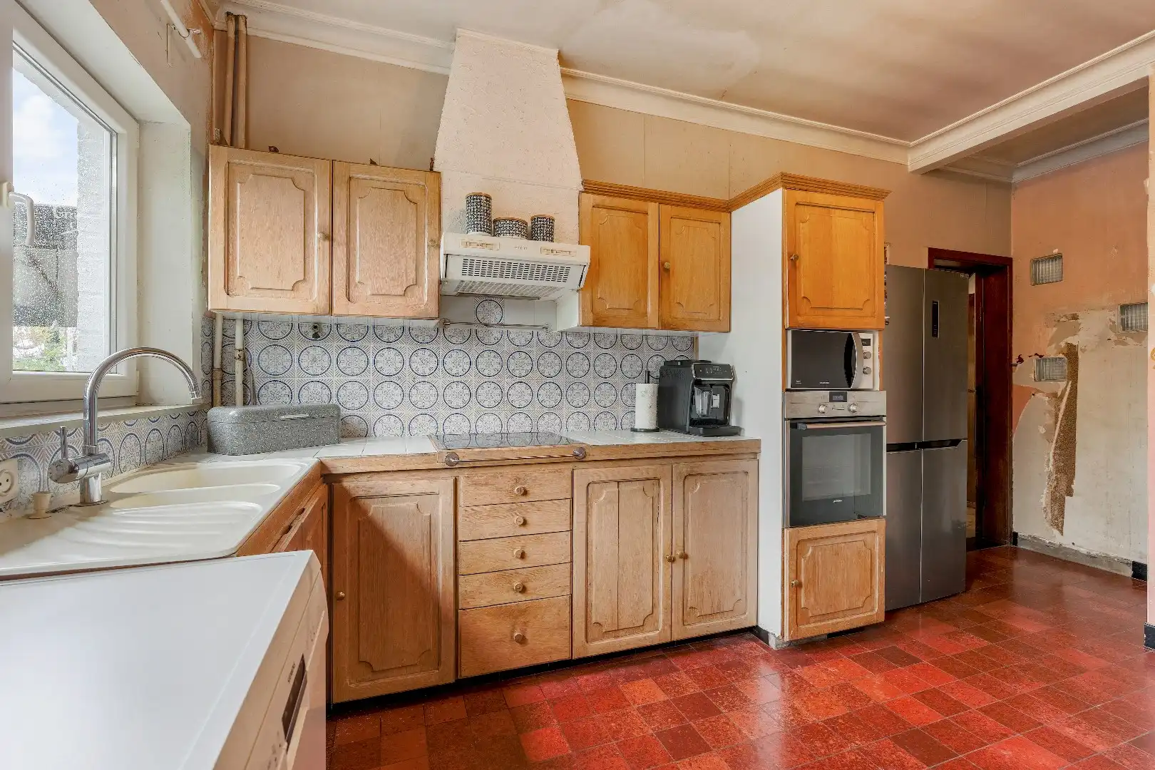 Op te knappen karakteristieke hoekwoning, 4 slpk, (EPC-label C) gelegen aan het Haspengouwse landschap. foto 23