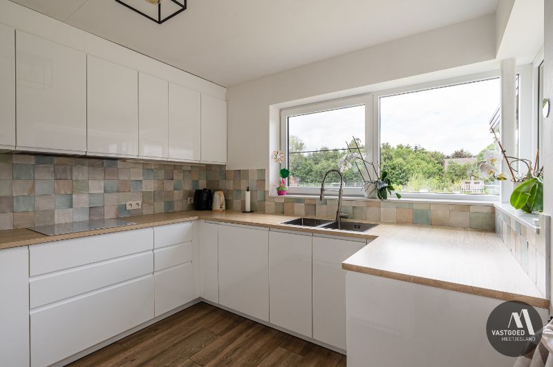 Recente energiezuinige woning met grote tuin foto 11