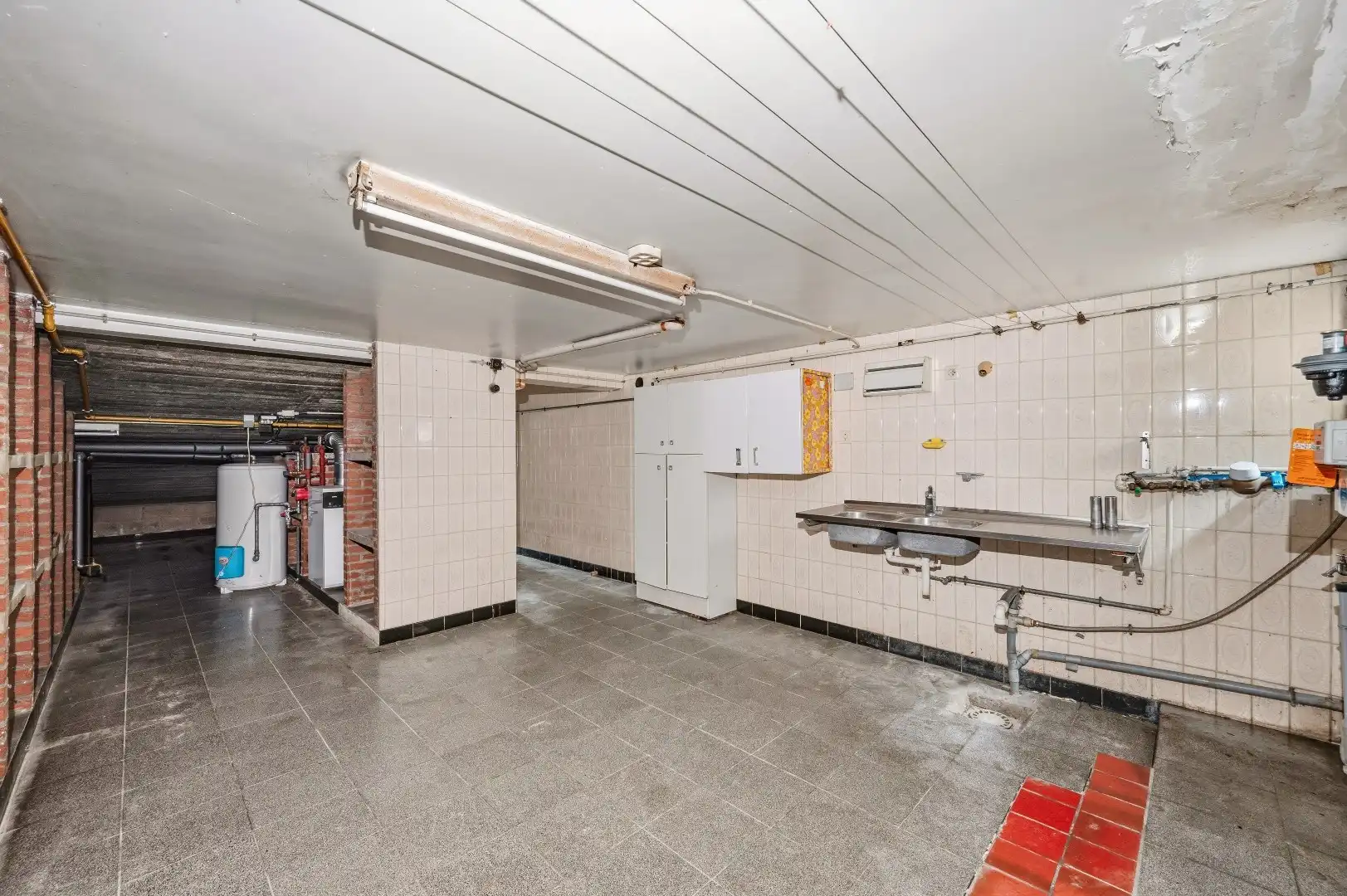 Te renoveren bel-étagewoning op topligging in het centrum van Tienen foto 19