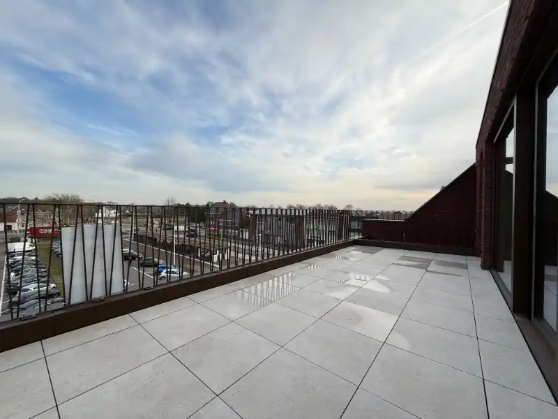 Prachtig BEN-penthouse met 1 slpk, terras, parking én zonnepanelen in het centrum van Houthalen foto 10