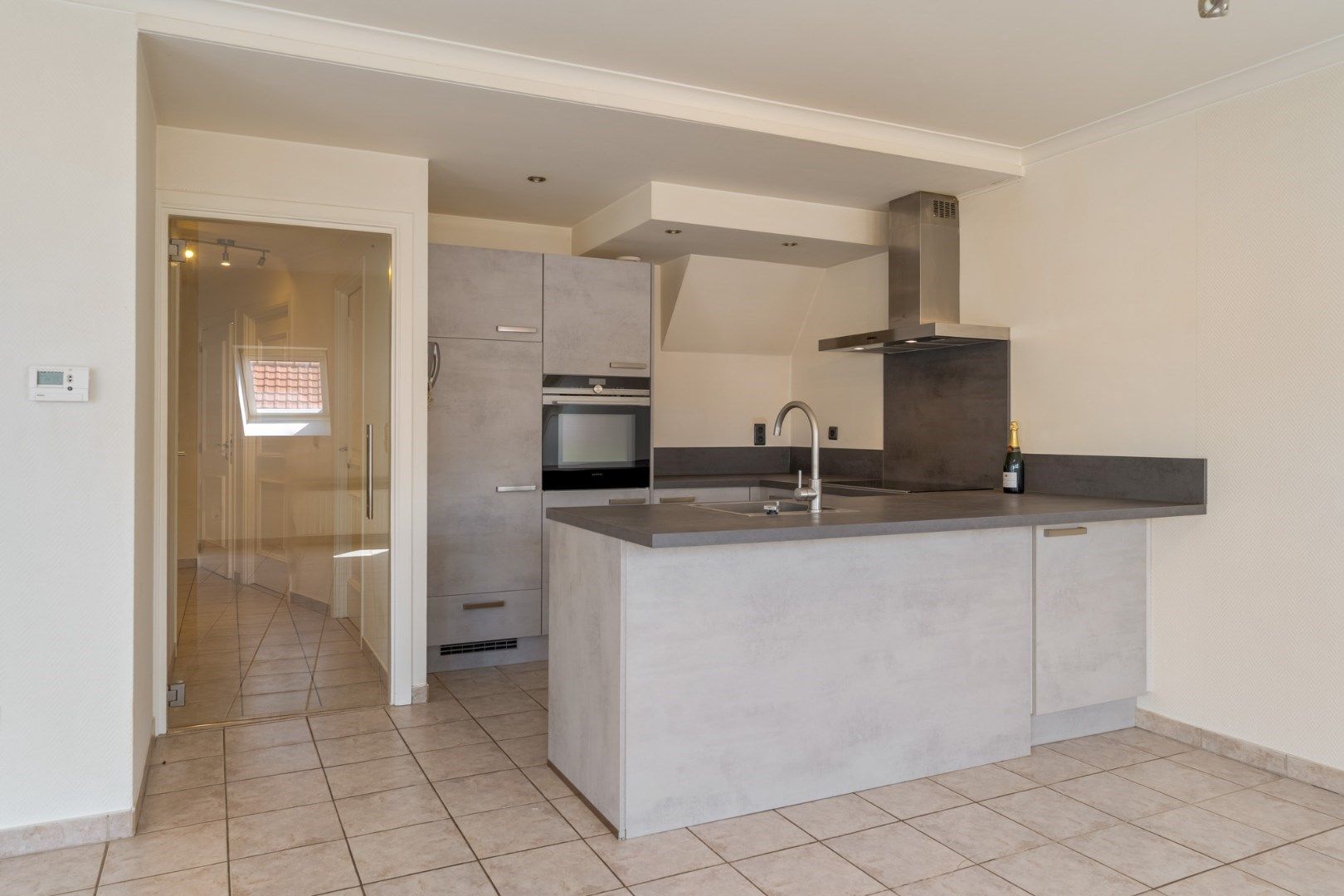 Goed verzorgd, gezellig duplex-appartement in het centrum met 2 slaapkamers, bureelruimte, terras foto 9