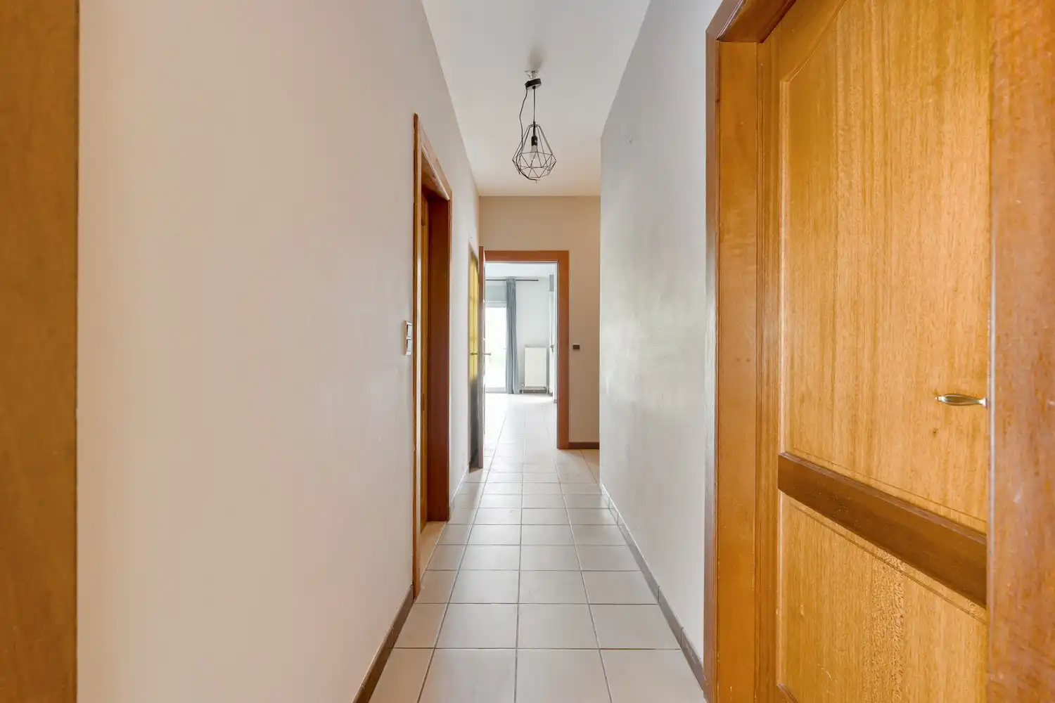 Gelijkvloers appartement met 2 slaapkamers, een ruim terras, 2 autostaanplaatsen, een kelder en een tuin grenzend aan de Vijvers van Bellefroid te Leuven! foto 8