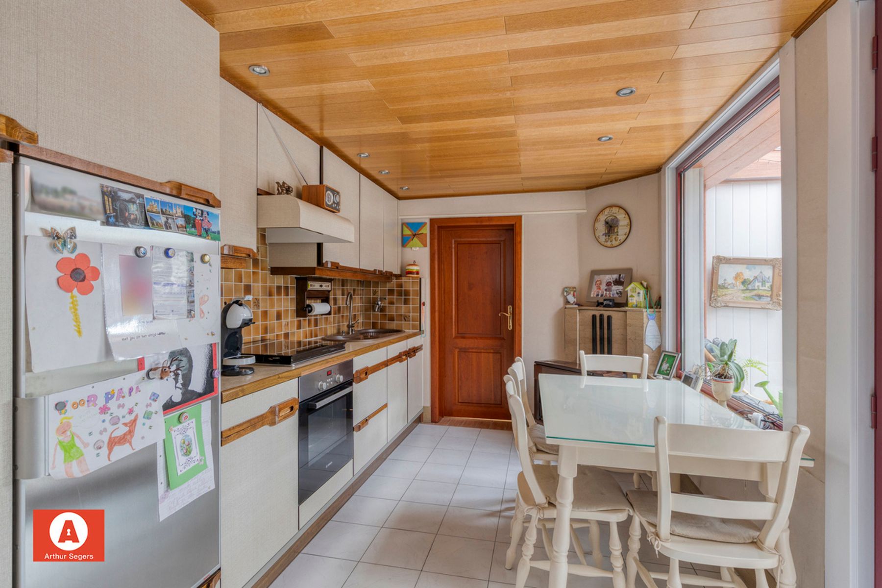 Verzorgde half-open bebouwing met oprit. foto 10