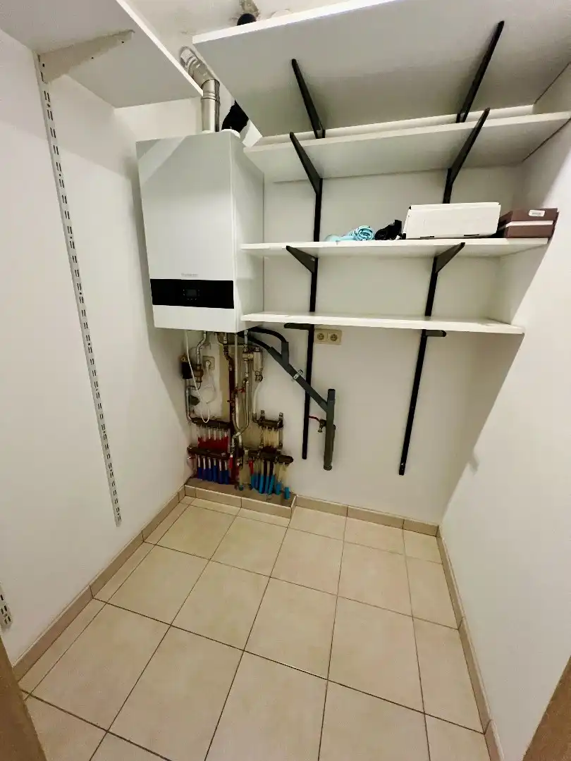 Gelijkvloersapp. met 2 slpks, terras, tuin en  autostaanplaats  foto 11