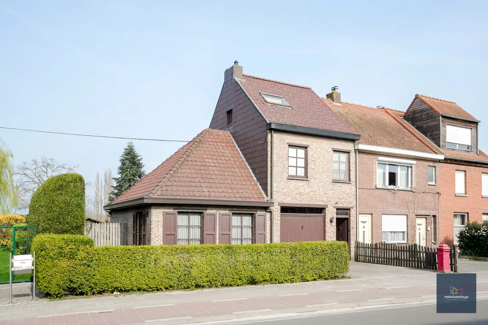 Ruime  halfopen bebouwing  met  zonnige tuin, terras en garage in Waarschoot  foto 2