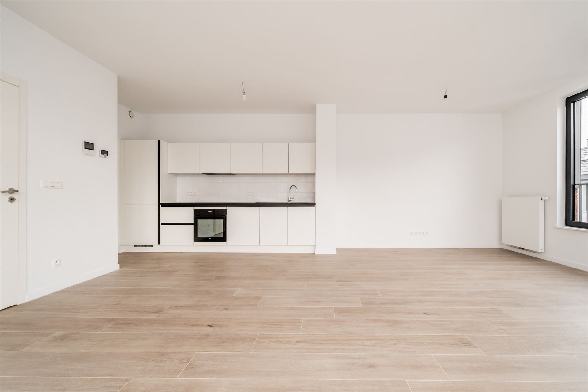 Dicht bij het Tour&Taxis-terrein, prachtig duplex penthouse met 3 slaapkamers foto {{pictureIndex}}
